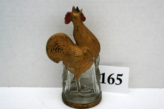 One of two Crowing Roosters in the sale, this one retains 95 percent of its original paint.<br />Image courtesy Old Barn Auction.